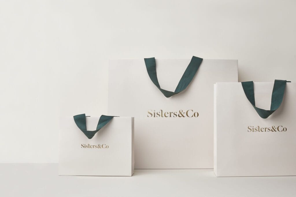 How Can Packaging Box Printing Achieve a Premium Look? 1 Sisters & Co's Custom Luxury Packaging for a Premium Shopping Experience