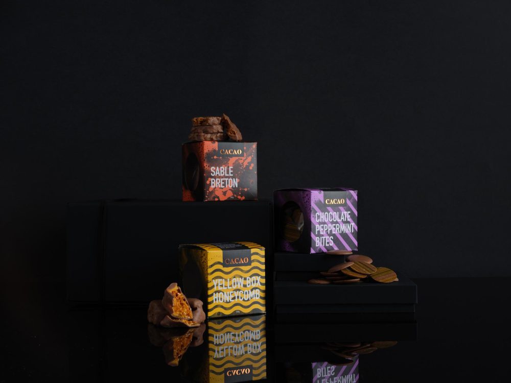 1734747347_Custom-Cacao-Packaging-Unleash-the-Joy-with-Vibrant-Boxes.jpg