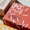 1736224378_Custom-Fini-Packaging-Delightful-Boxes-Filled-with-Joyful-Treats.jpg